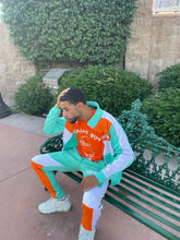 Load image into Gallery viewer, Teal/White/Orange Tracksuit
